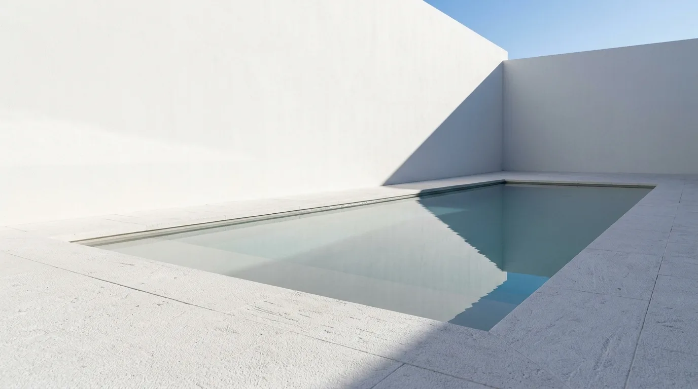 Minimal White: A Sheet of Water, A Shadow, Nothing Else